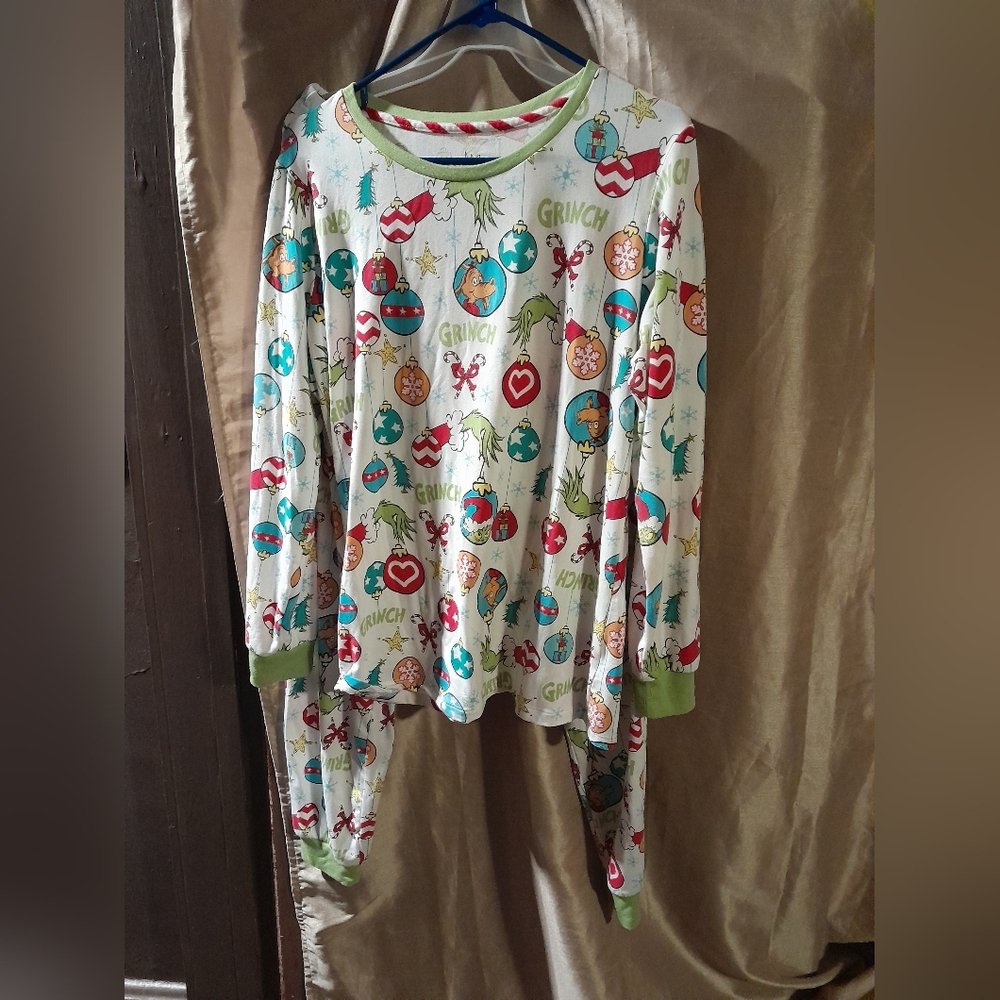 The Grinch woman's size small 4 to 6 two piece pajamas.
